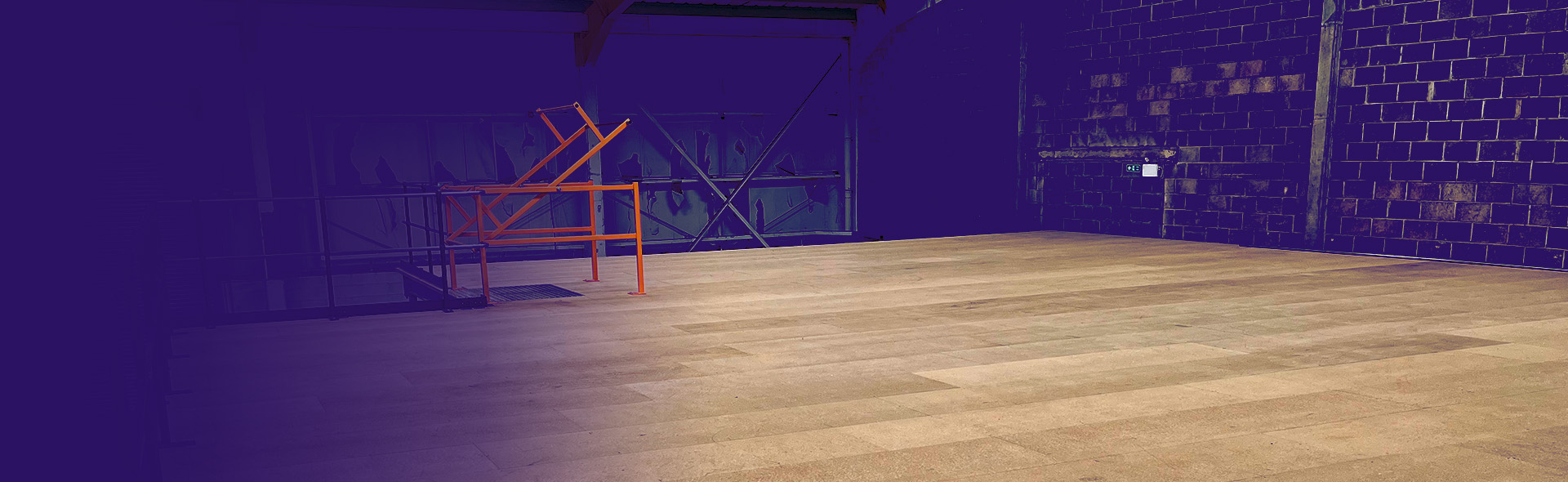 Workers on a newly installed mezzanine floor